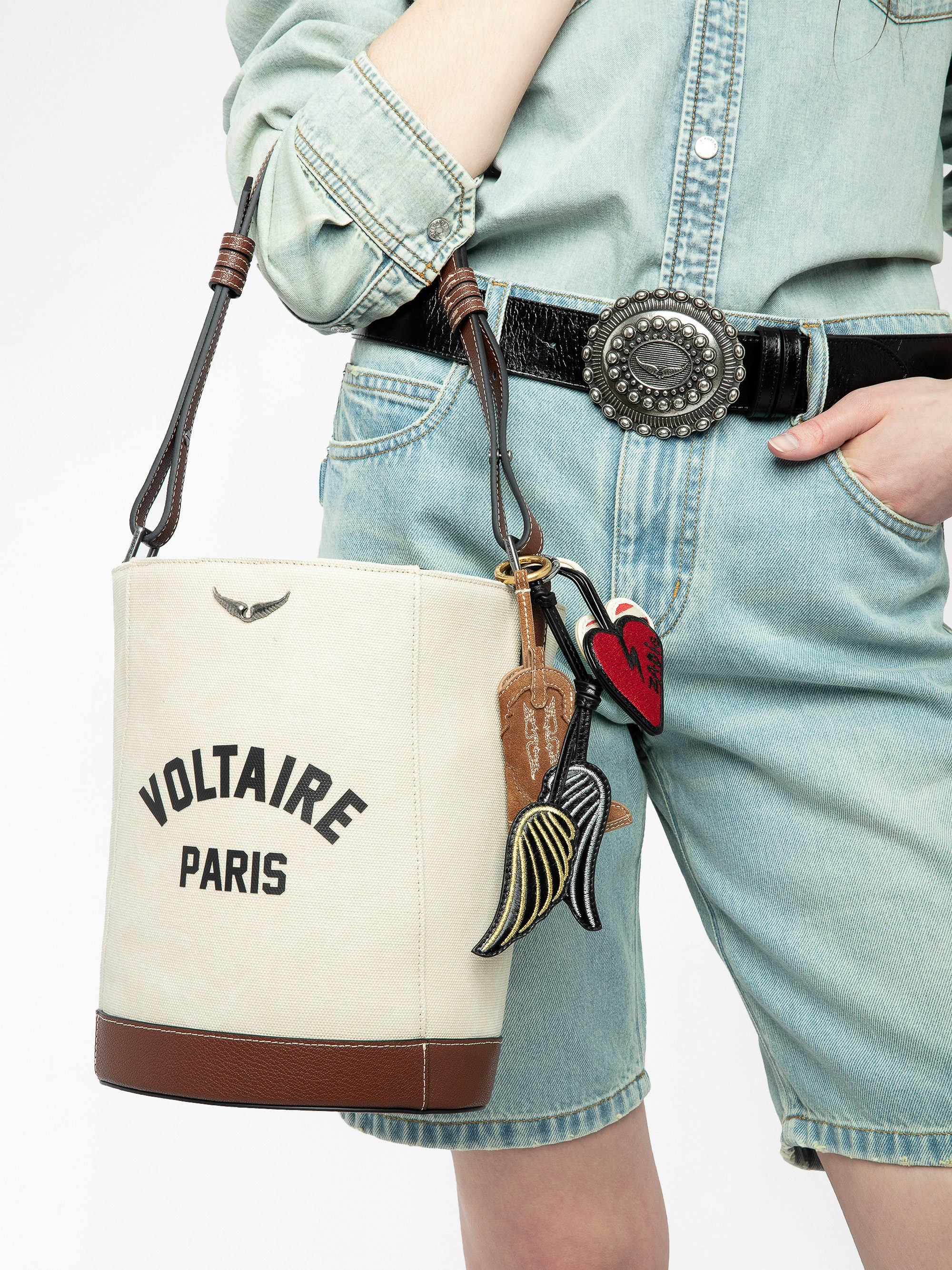 Z Bucket Voltaire Bag - Canvas and grained leather bucket bag with adjustable strap and wing signature.